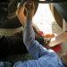 Ray Torgerson receives help locking into the axle of a TransCanada pipe-carrying truck Tuesday.
