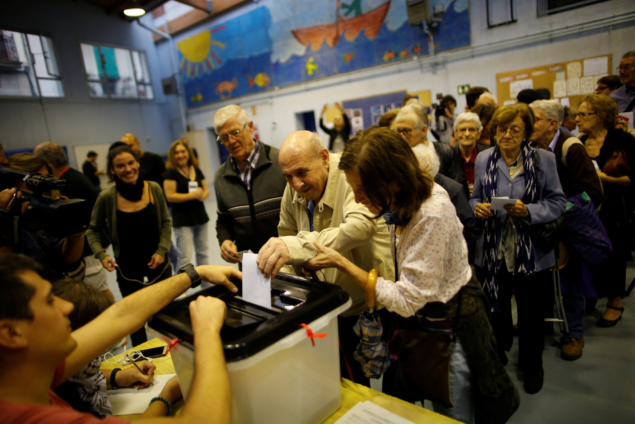 Some Catalans managed to cast ballots at a school in Barcelona on Sunday. Credit Jon Nazca/Reuters