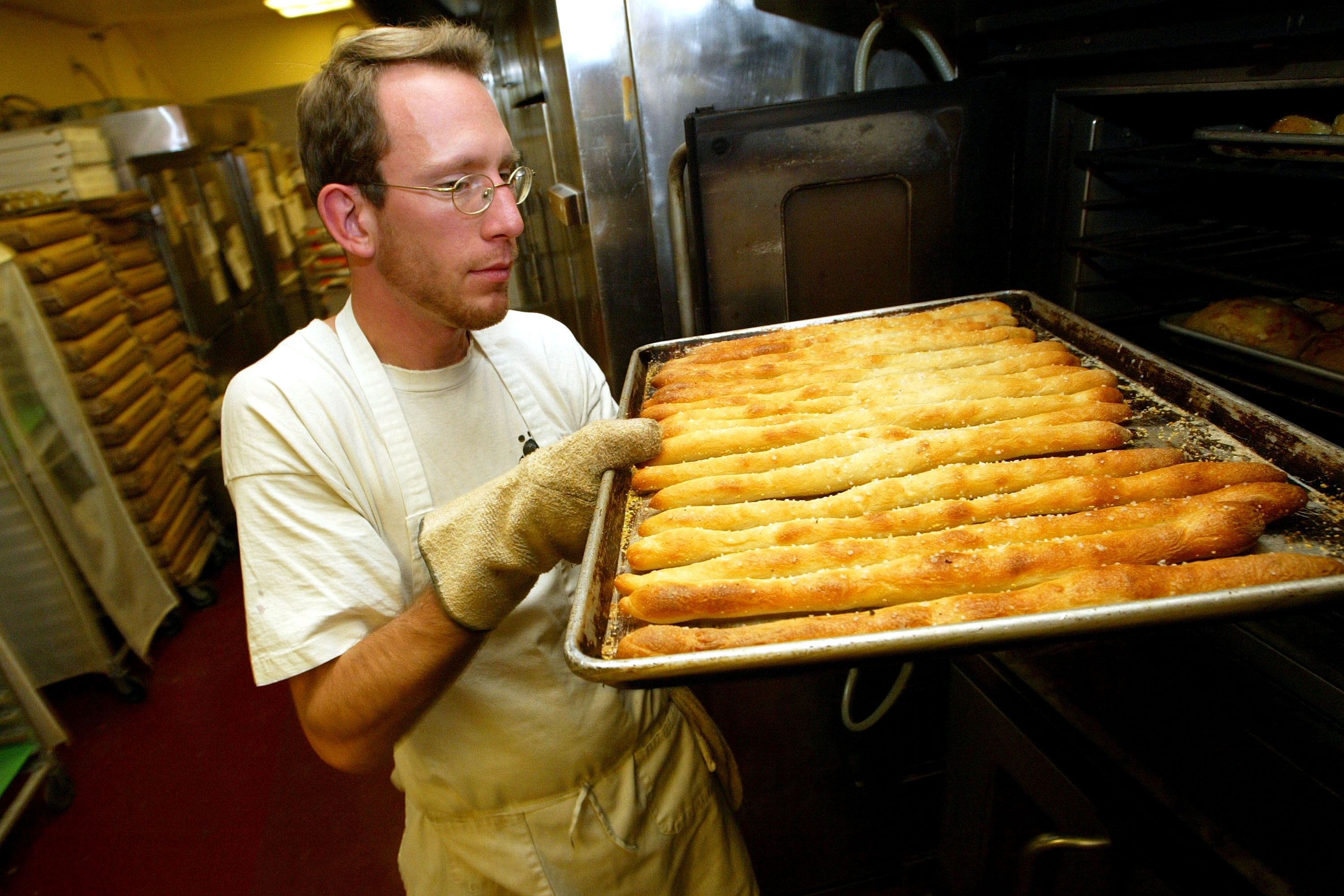 An employee at Arizmendi Bakery in 2003. The co-op now has six affiliate bakeries throughout the Bay Area. Justin Sullivan/Getty Images