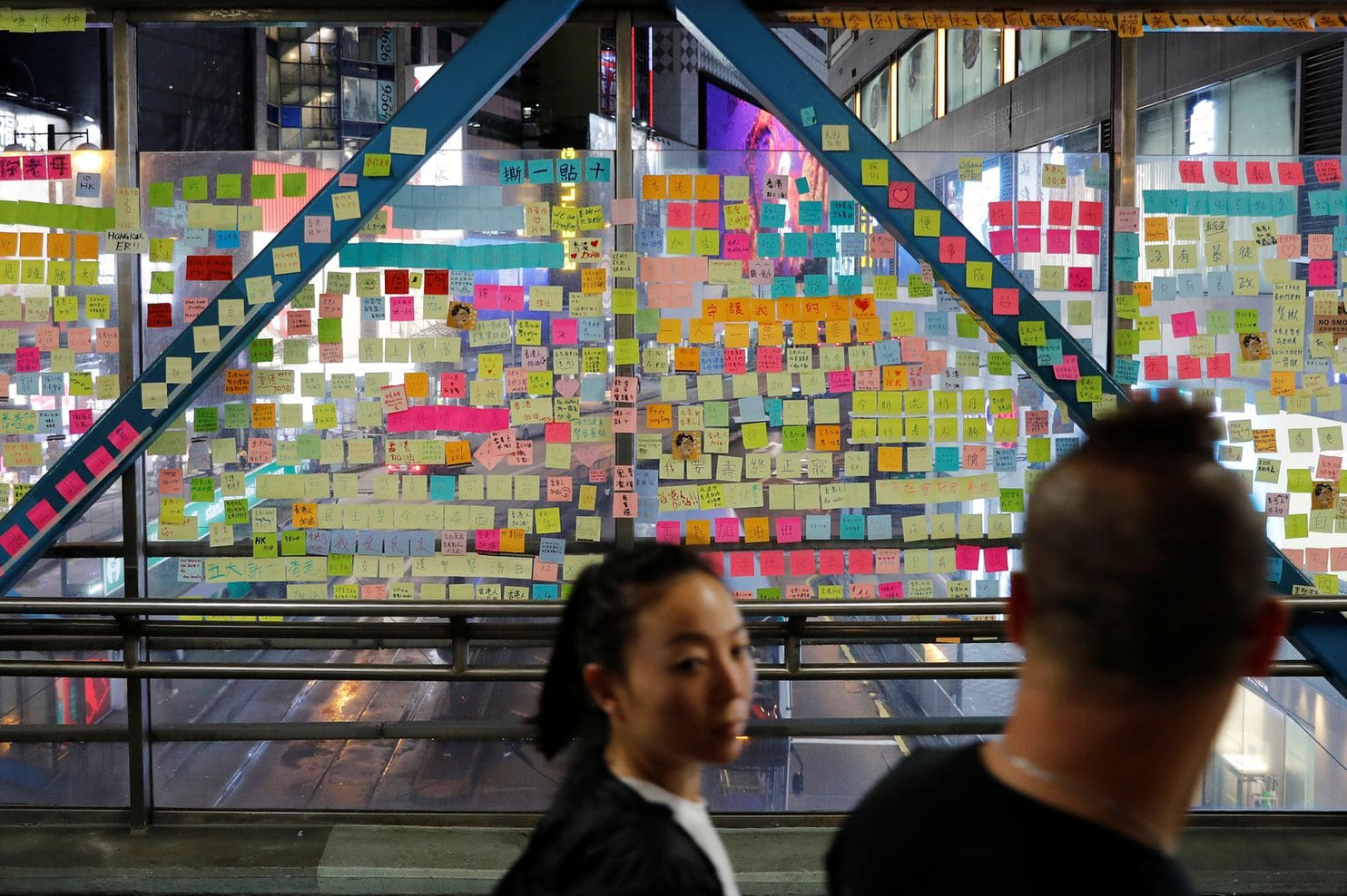 Sticky notes with messages backing protesters and their demands cover a “Lennon Wall” at Causeway Bay in Hong Kong. (Tyrone Siu/Reuters)