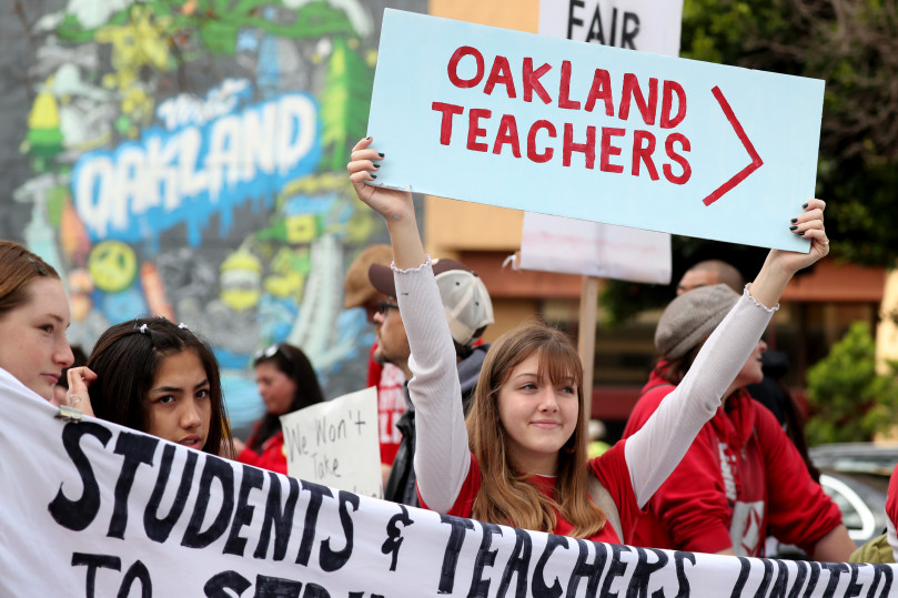 Teachers, students, and parents walk the picket line