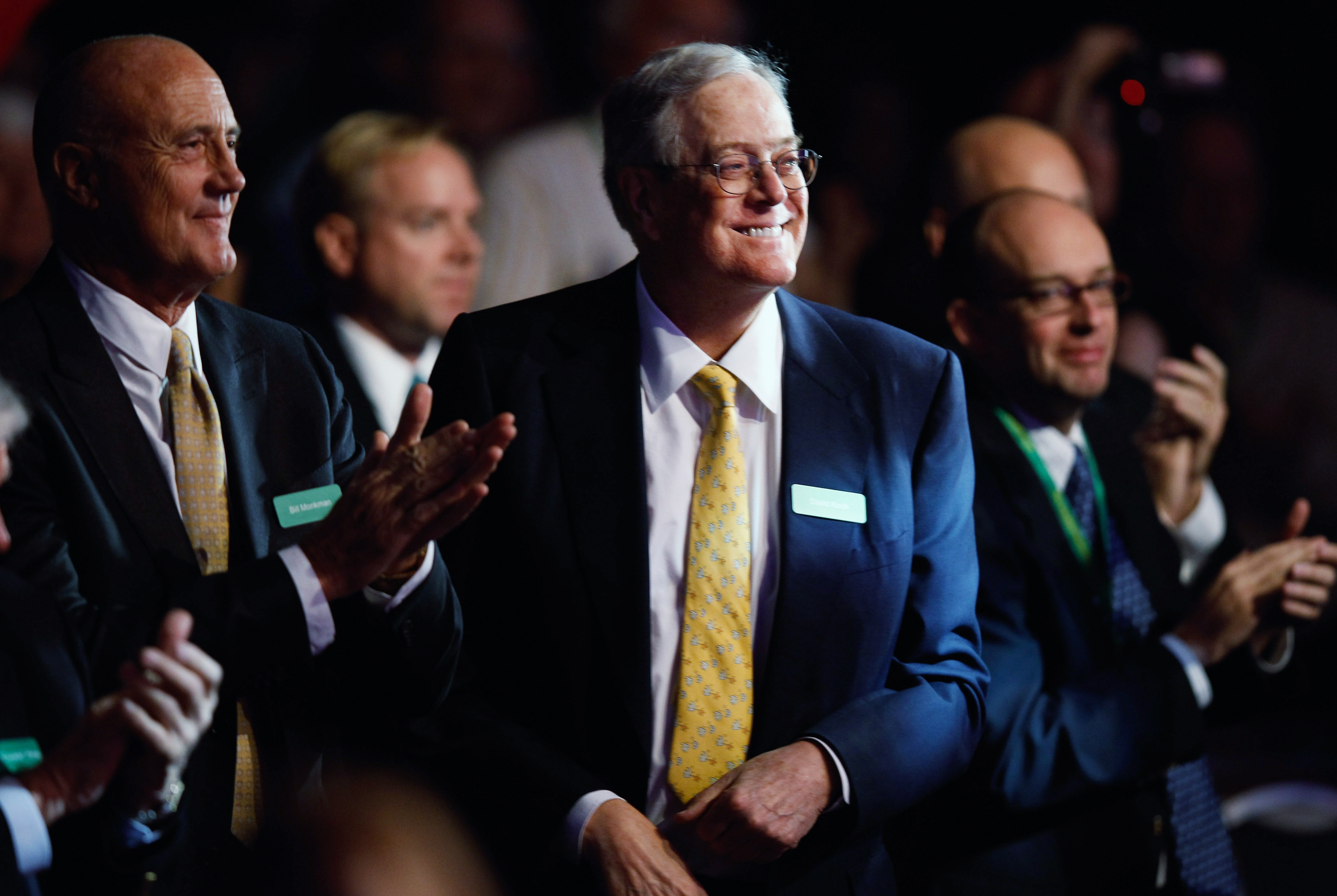 Americans for Prosperity Foundation Chair and Koch Industries Executive Vice President David H. Koch, center, at the Defending the American Dream Summit on Nov. 4, 2011, in Washington, D.C. Photo: Chip Somodevilla/Getty Images