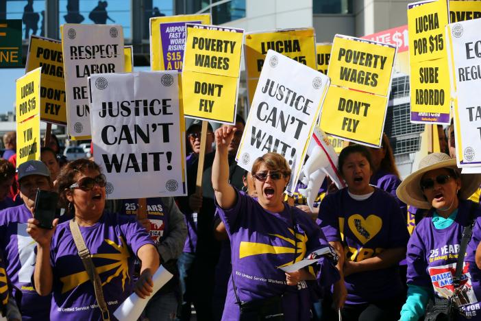Fight for $15, living wage, minimum wage hikes, Service Employees International Union, protest arrests, Bernie Sanders, Donald Trump, overtime pay