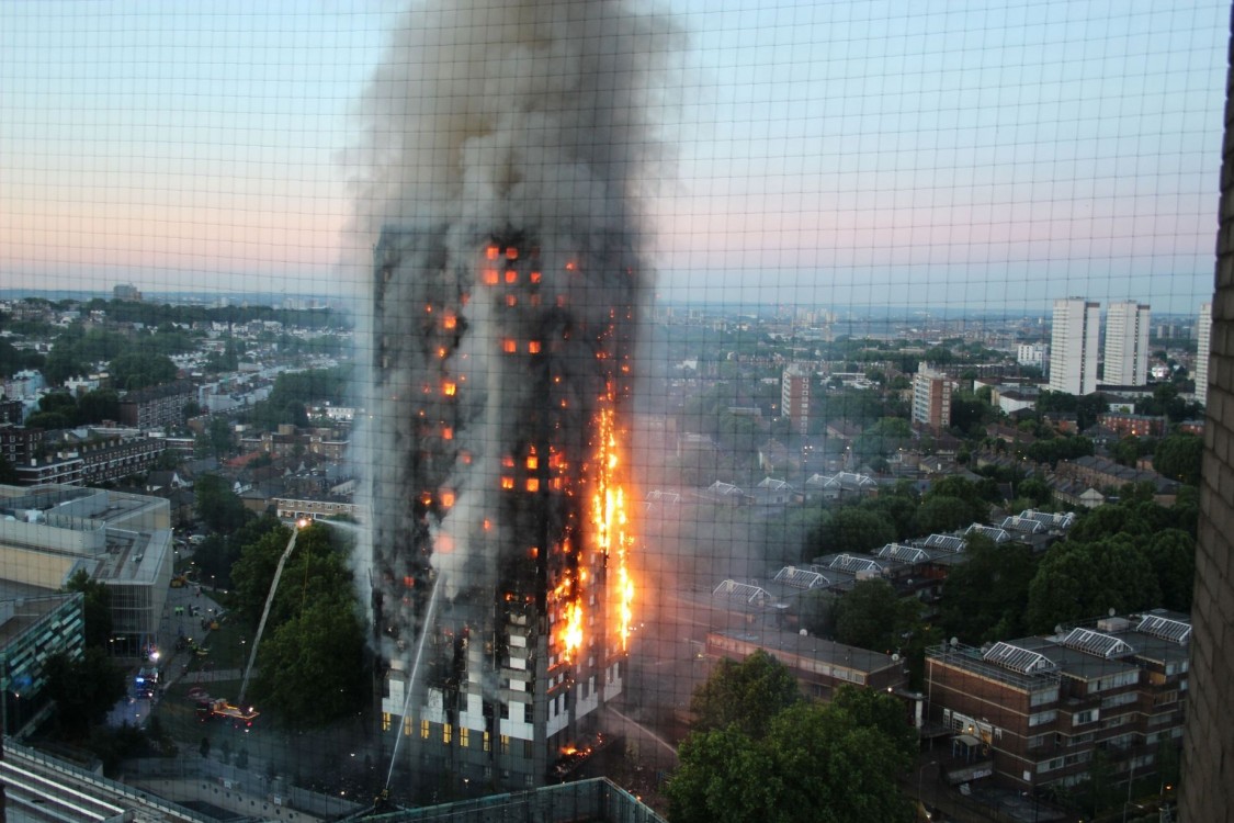 Grenfell Tower, London fire, Justice for Grenfell, profit over people, Theresa May, government negligence