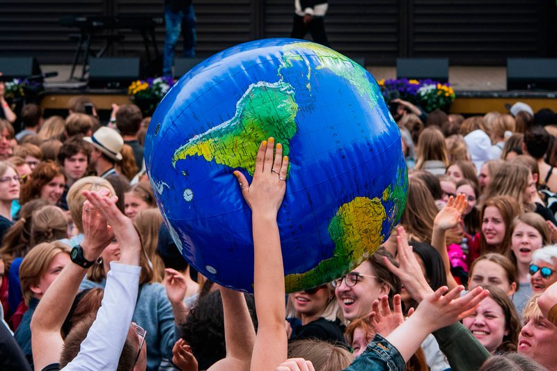 Protesters throw an earth-shaped ball during the "Global Strike For Future" demonstration in Stockholm on May 24, 2019. Jonathan Nackstrand—AFP/Getty Images