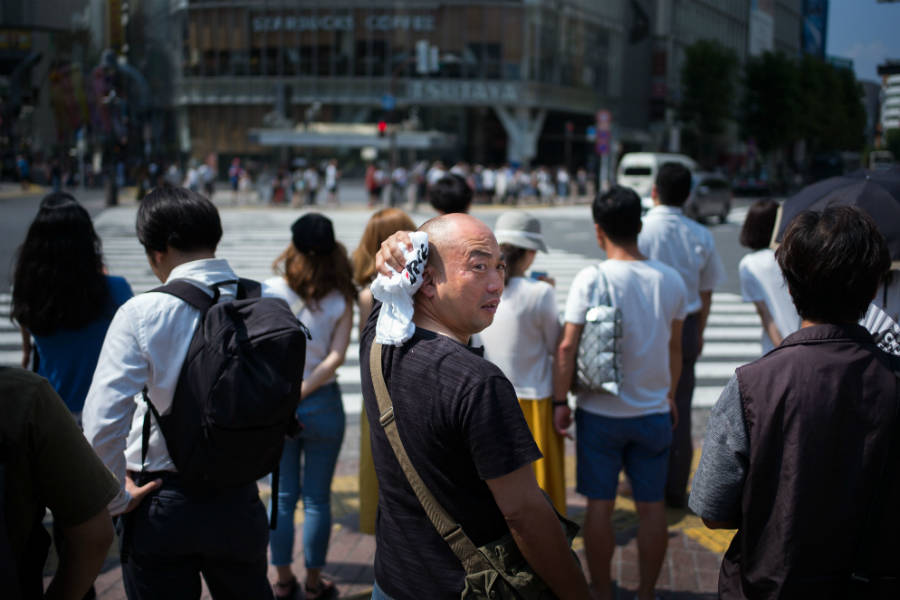 Extreme heat killed more than 80 people in Japan in July, just a few weeks after flooding from downpours was blamed for more than 200 deaths there. Martin Bureau/Getty Images