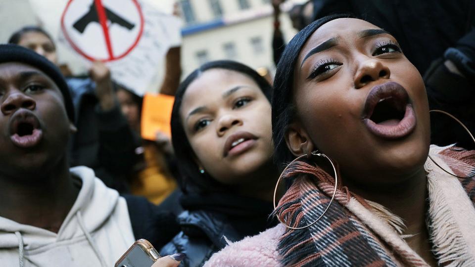 Students from surrounding schools gather at Zuccotti Park in lower Manhattan to mark one month since the high school shooting in Parkland, Florida. Spencer Platt/Getty Images