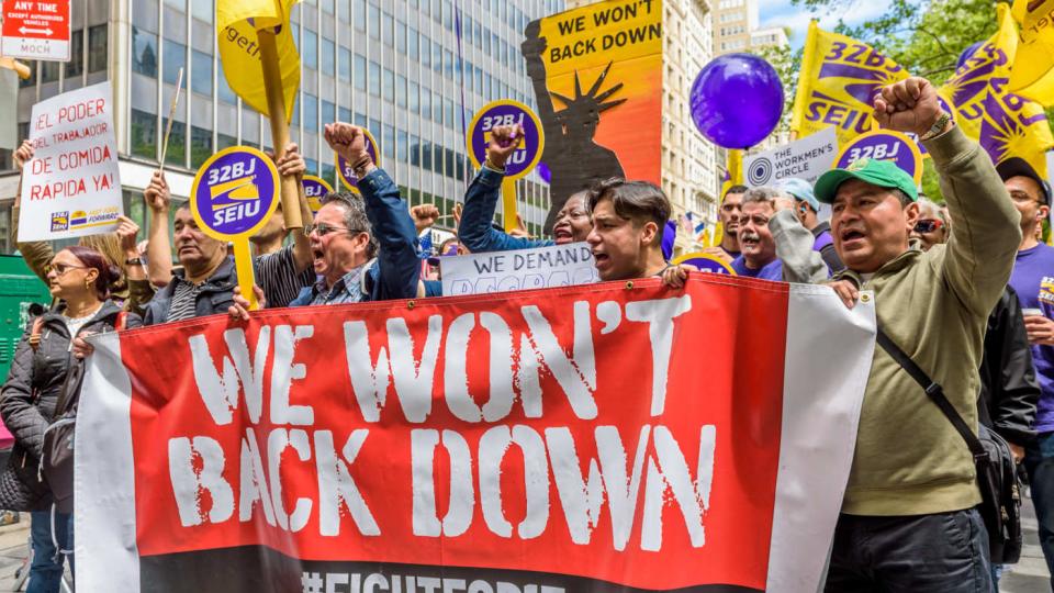 Fast-food workers, cashiers, cooks, delivery people and their supporters rally outside New York City Hall on May 24, 2017. Photo: Pacific Press/LightRocket via Getty Images
