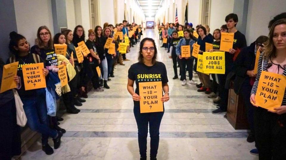 Sunrise Movement, climate policy, climate crisis, carbon emissions, Green New Deal, Alexandria Ocasio-Cortez, Nancy Pelosi, Democratic leadership, Democratic National Committee, green jobs, renewable energy economy