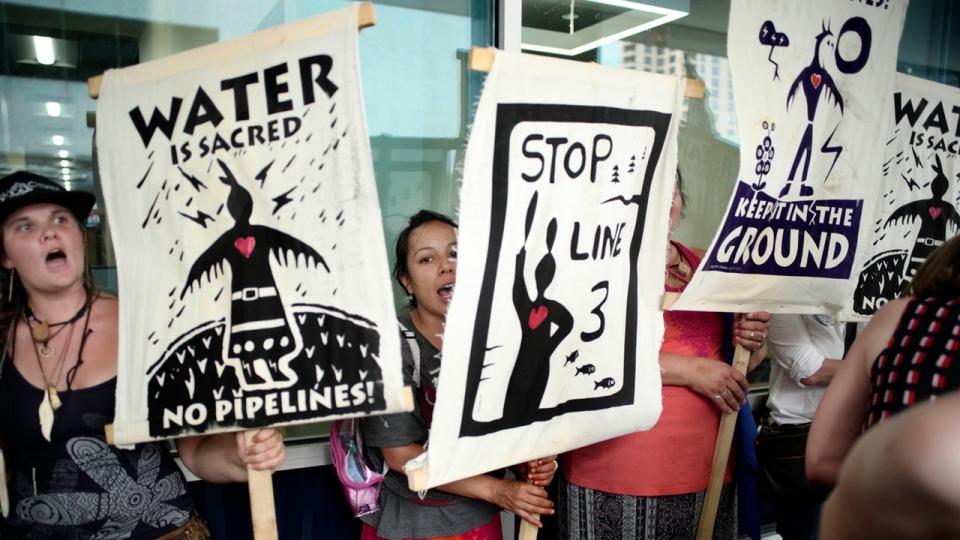 Activists protest the approval of Enbridge’s proposal to replace its aging Line 3 pipeline on June 28, 2018, in St. Paul, Minn. Photo: Richard Tsong-Taatarii/Star Tribune/AP