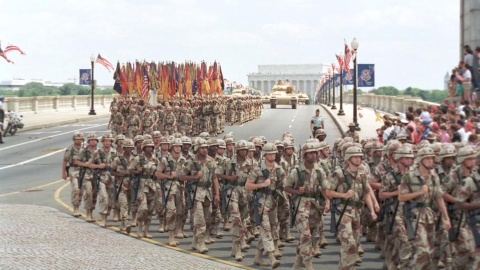 Troops march over Arlington Memorial Bridge as they head toward the Pentagon during the National Victory Day Parade on June 8, 1991. The parade celebrated the end of the Gulf War. (Doug Mills/Associated Press)