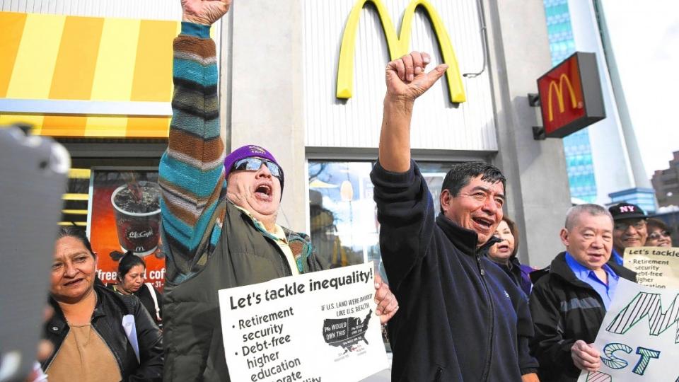 raising the minimum wage, $15 an hour minimum wage, low wage workers, Walmart worker strikes, SNAP, food stamps