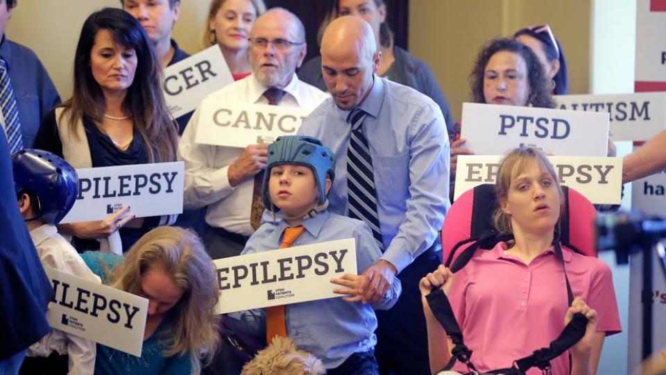 Utah residents show support for a ballot initiative that would legalize medical marijuana in the state. AP Photo/Rick Bowmer