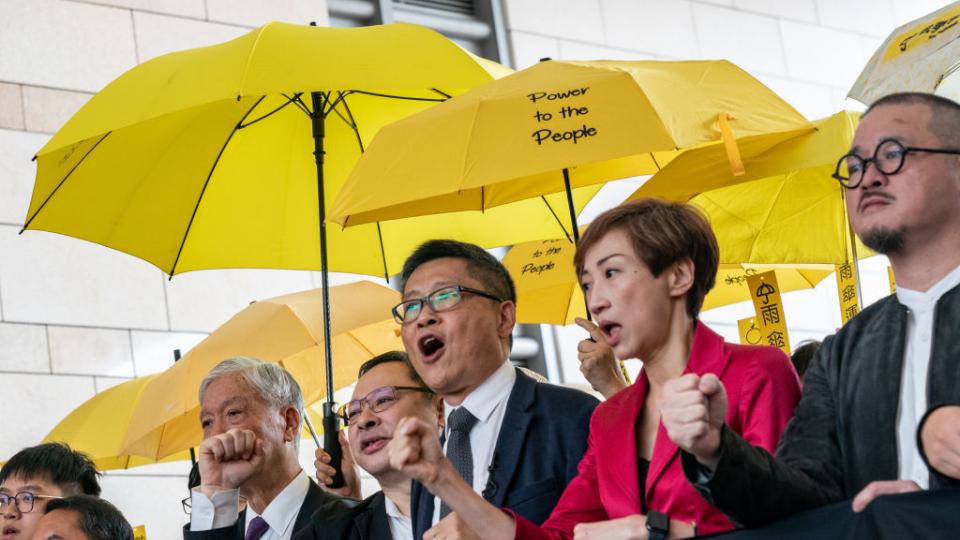 Occupy co-founders Reverend Chu Yiu-ming, Benny Tai and Chan Kin-man protest outside the West Kowloon Court on Nov. 19, 2018 in Hong Kong. Anthony Kwan—Getty Images