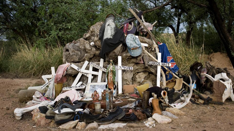 A shrine, made of objects found on migrant trails, honors the lives of those who have died in the desert, at the No More Deaths camp in Arivaca, Ariz. Photo: Matt Nager/Redux