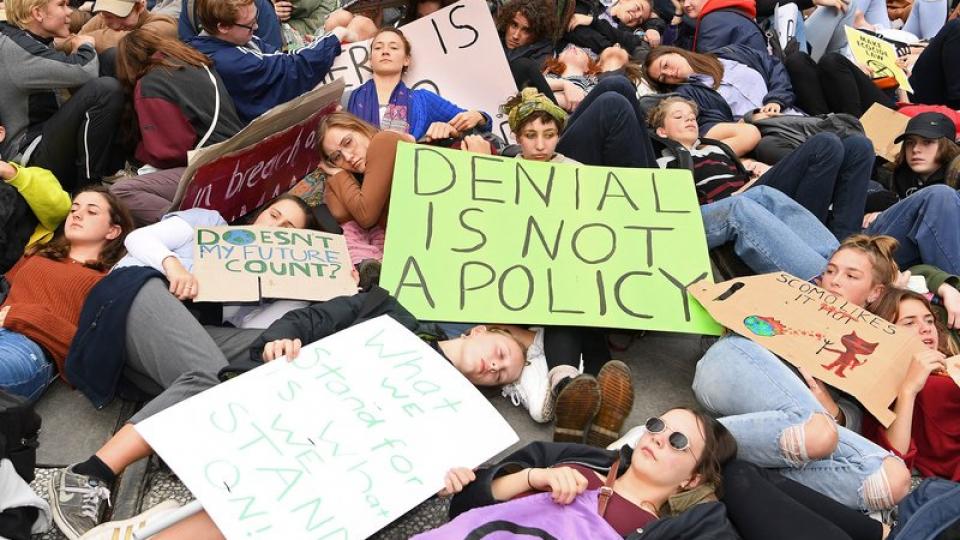 Protestors stage a 'Die In' in at the corner of Bourke and Swanston Streets in Melbourne, Australia on May 24, 2019. Protestors including the 'Extinction Rebellion' took to the CBD in order to show the Earth's sixth mass extinction in reaction to Climate 