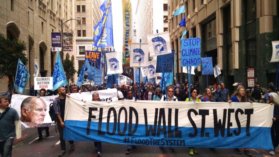 Flood Wall Street West, funding climate change, carbon emissions, Flood the System, Paris climate summit, Chevron, predatory lending, Wells Fargo