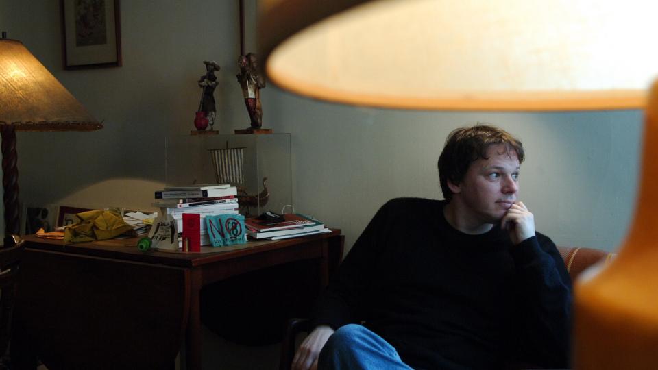 David Graeber at his home in Manhattan in in 2005. A public intellectual, professor, political activist and author, he captivated a cult following that grew globally with each book he published over the last decade.Credit...Jennifer S. Altman for NYT