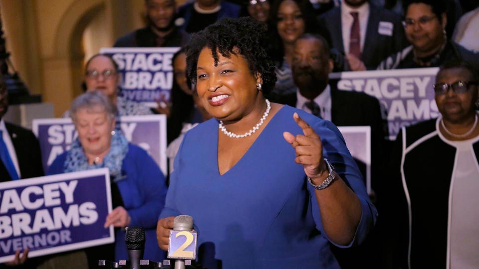 Stacey Abrams holds a news conference in Atlanta to announce she has qualified to run for governor. (Bob Andres / Atlanta Journal-Constitution via AP)