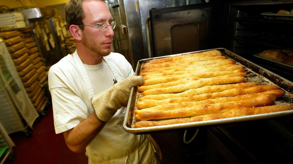 An employee at Arizmendi Bakery in 2003. The co-op now has six affiliate bakeries throughout the Bay Area. Justin Sullivan/Getty Images